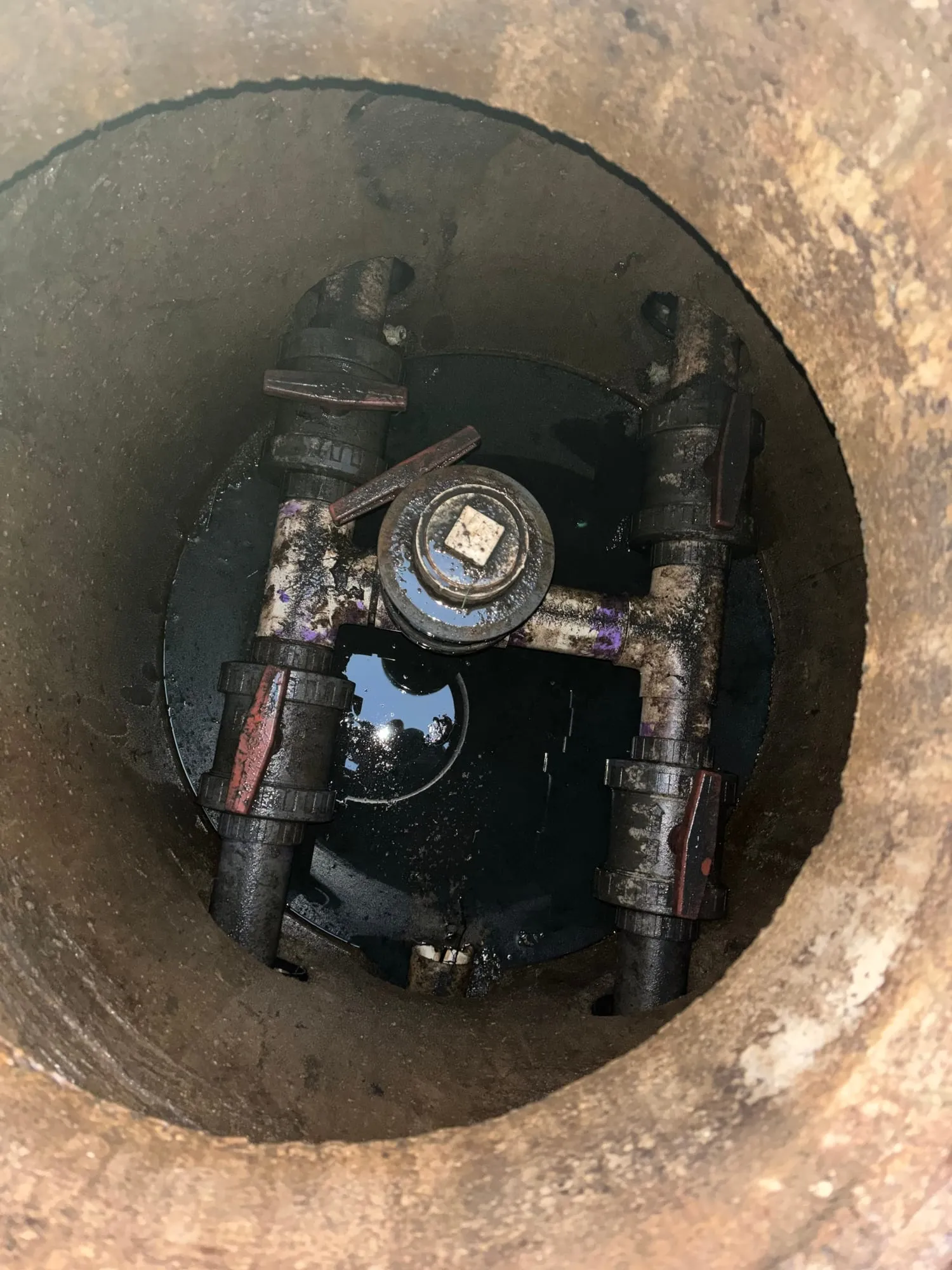 Pump discharge piping and valves inside a pump station basin