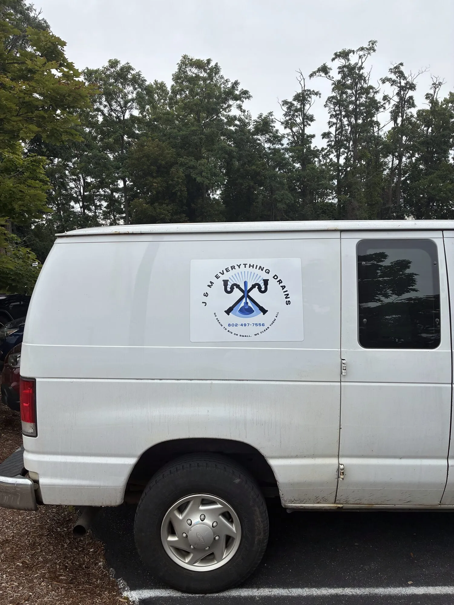The J & M Everything Drains service van