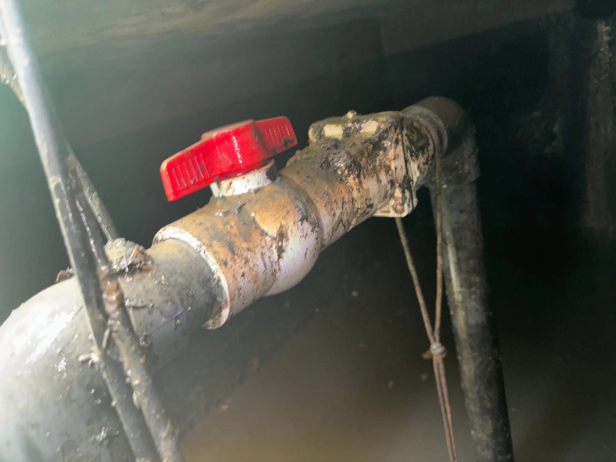 A shutoff valve on the piping inside a pit